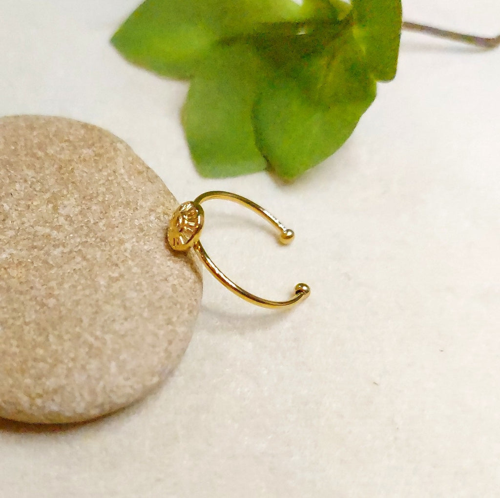 Bague réglable en acier doré et soleil